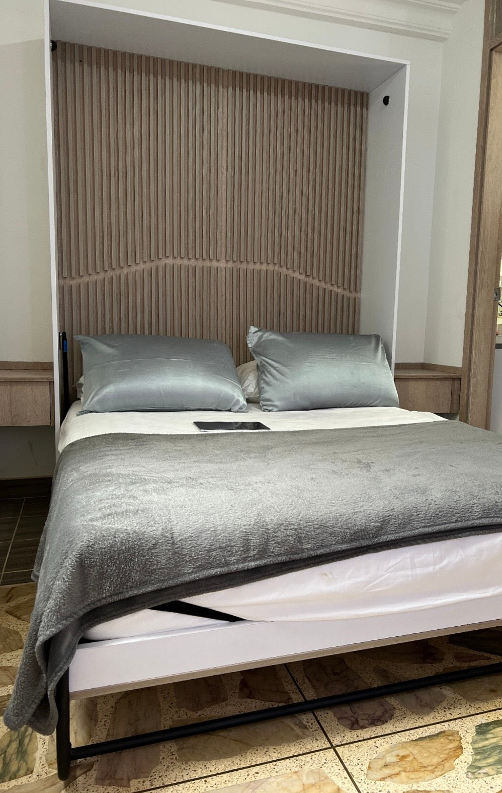 Cama abatible