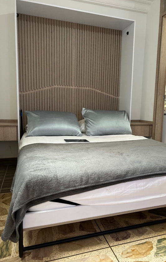 Cama abatible